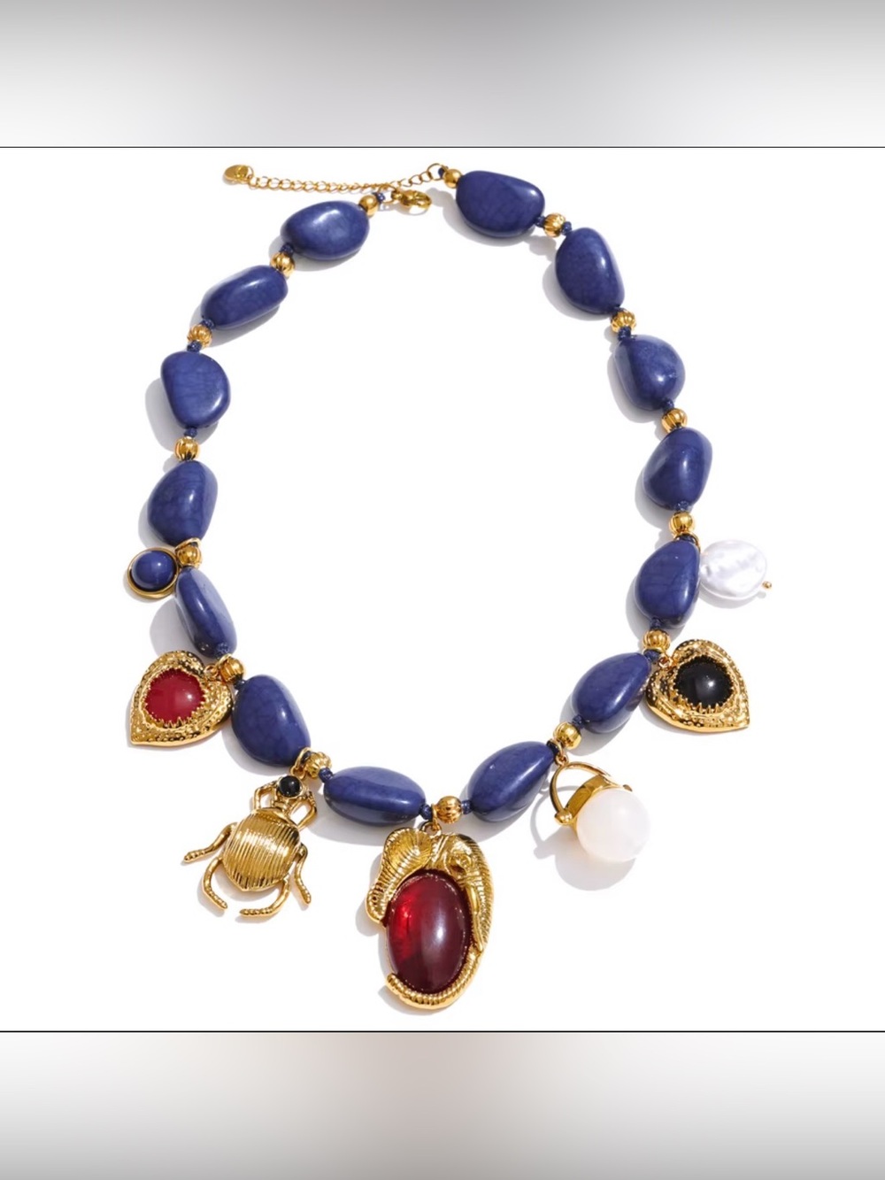 Blue Stone Charm Necklace with Gold Accents and Multi-Colored Charms